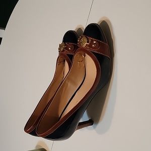Patent leather navy blue and brown heels with gold detail